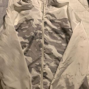 Men small camo and white windbreaker